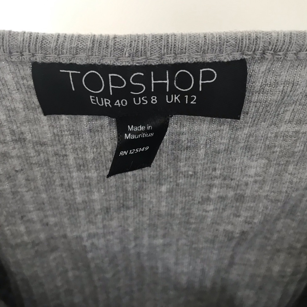 A grey tank top from Top Shop!